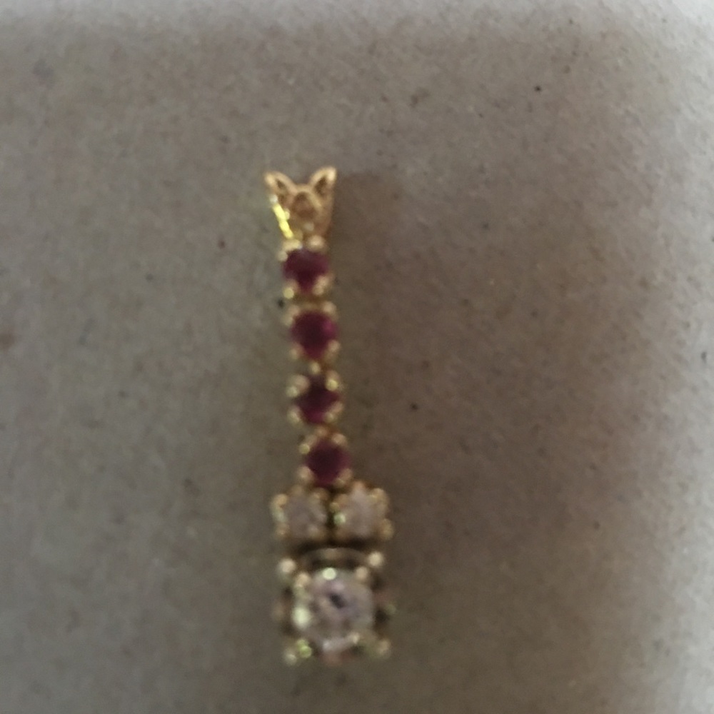 Beautiful charm. Ruby and diamonds